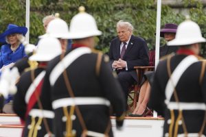 Trump, first woman view uncommon 'Beating Retreat' army spectacle in England