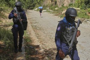 Gang assault on armored car in Haiti leaves 2 law enforcement officials injured and 1 driver lifeless