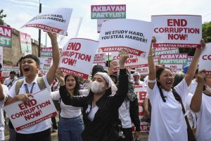Philippine police arrest 17 for hurling rocks as hundreds peacefully protest corruption Philippine police arrest 17 for hurling rocks as hundreds peacefully protest corruption