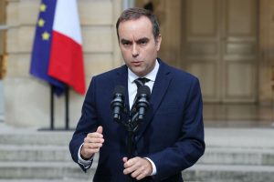 France's new prime minister names a authorities which may not final lengthy