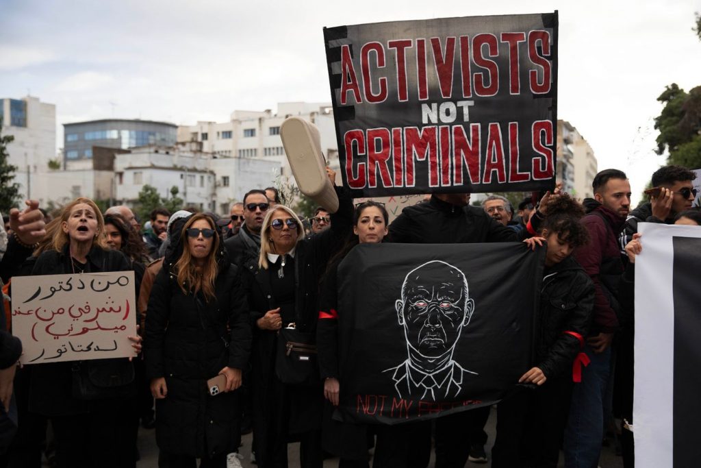 Tunisian police detain main human rights defender as sweep towards critics widens Tunisian police detain main human rights defender as sweep towards critics widens